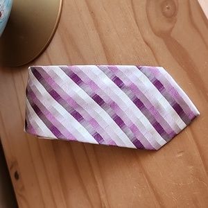 Joseph & Feiss tie new tag on